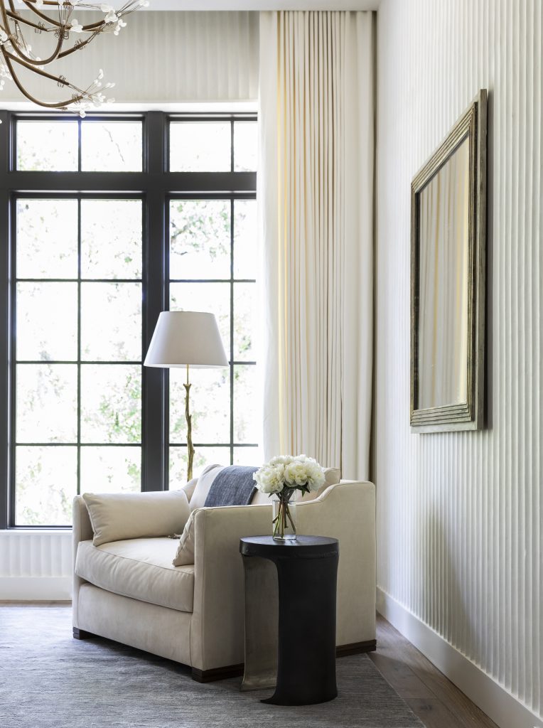 Segreto plaster fluting detail on an interior wall showing light and shadow — Marie Flanigan Interiors, photography by Julie Soefer