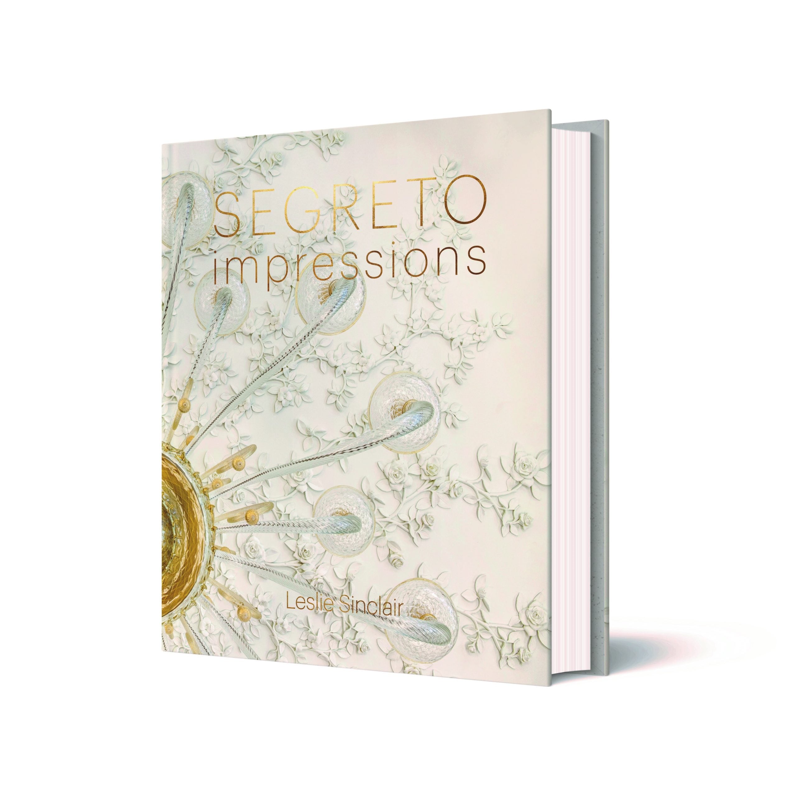 Cover of Segreto Impressions design book by Leslie Sinclair featuring luxury interior finishes and plaster artistry