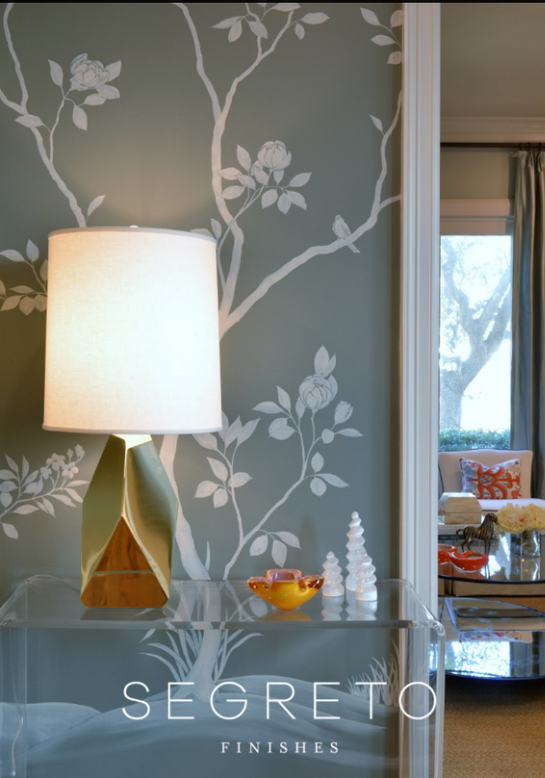 Dramatic dining room with bold Segreto plaster finish and decorative painted details — luxury interior project