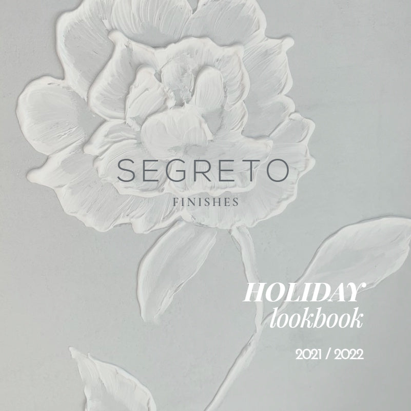 Segreto Holiday Lookbook cover featuring a beautifully decorated seasonal interior with plaster finishes