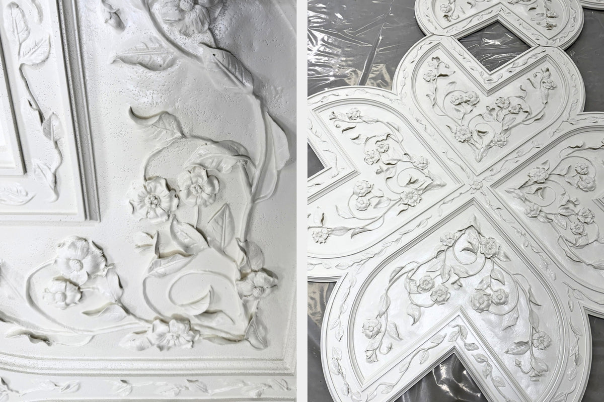 A split view showing a white decorative embossed panel with floral and scroll relief details, photographed close up against a neutral background.