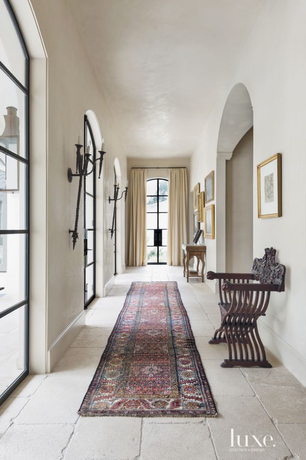 Segreto Secrets - Mediterranean Traditional Home Tour - Entry Hall with Plastered Walls and Moroccan Rug