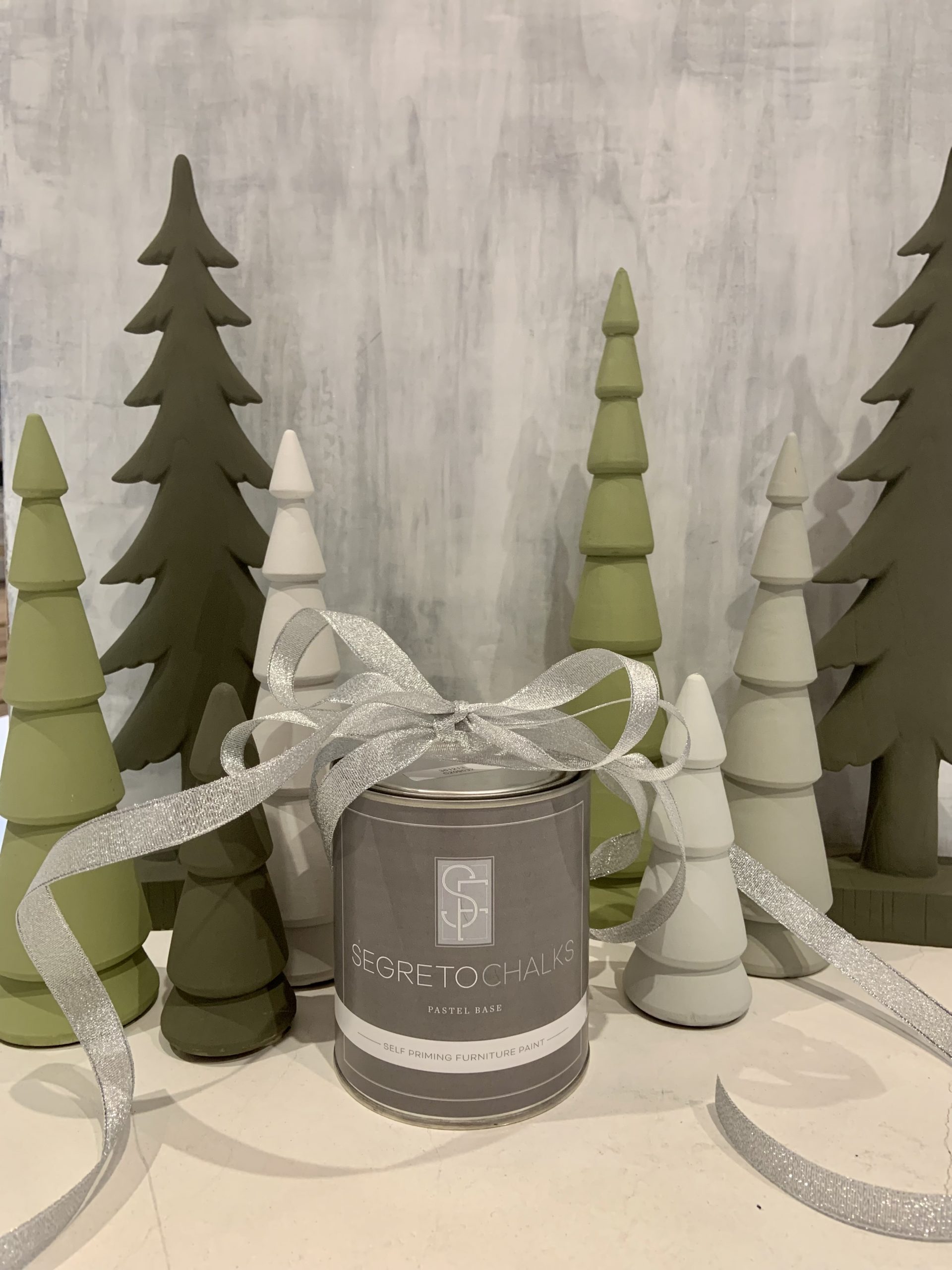 Chalk paint can with winter theme decor